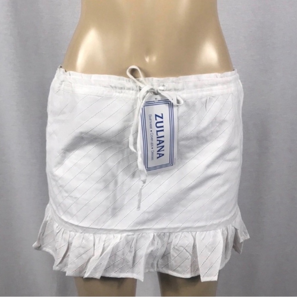 12pcs Zuliana Size Large White Ruffled Skirt, New.